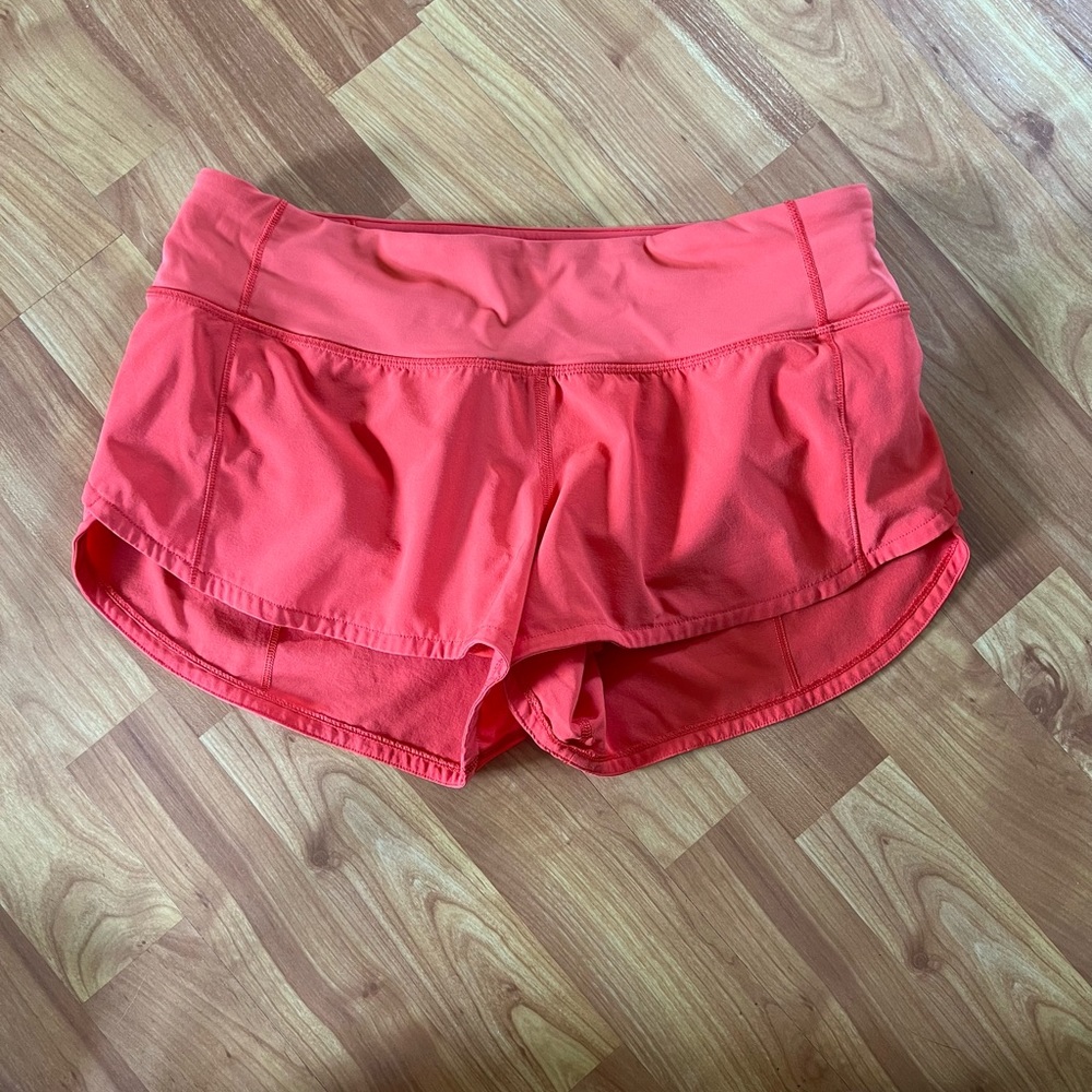 Orange lululemon speed up shorts 2.5
